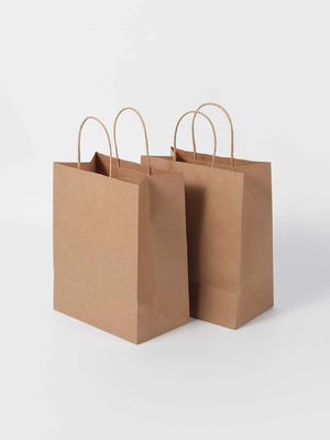 Bolsas de papel marrón con mango retorcido Bolsas de compras Kraft marrón ligeras
