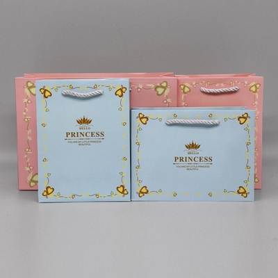 Bolsa de papel de compras reutilizable de impresión personalizada de varios colores con mango retorcido
